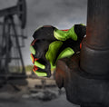HexArmor 4021X GGT5 Hazard glove gripping a metal pipe